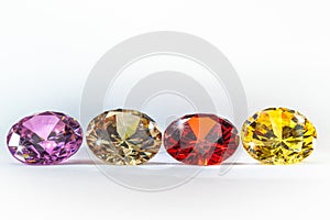 colorful gems on white background photo