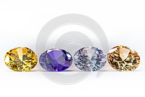 colorful gems on white background photo