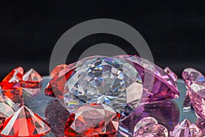 colorful gems on black background photo