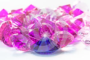 colorful gems on white background photo