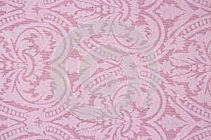 Light pink fabric texture with patterns.