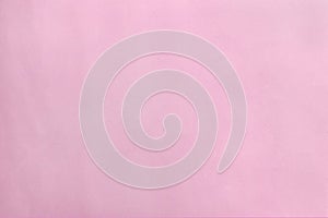 Light pink paper backgroundight pink, rose color craft paper textured background.