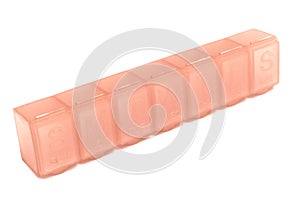 A light pink plastic weekly pill medicine box white backdrop