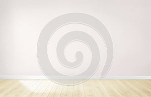 Light pink wall in an empty room with a wooden floor