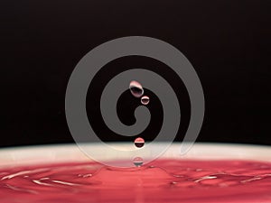 Light pink water drop motion freez photo