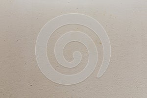 Light plaster wall texture background closeup