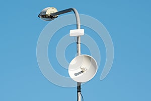 A light pole equipped with a transmitter with antennas for wireless, high-speed internet