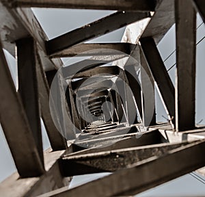 Light pole seen from below creating a unique and endless perspective