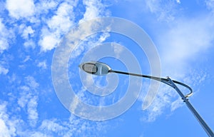 Light poles. Street lamp against blue sky background