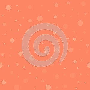 Light polka dots seamless pattern on coral background