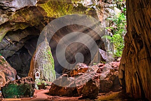 Light rays inside of the Sadan cave near Hpa-An in Myanmar photo
