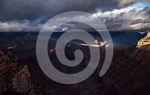 Light Rays Pierce through Clouds in The Grand Canyon