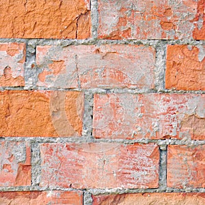 Light red brick wall texture macro closeup, old detailed rough grunge cracked textured bricks copy space background, grungy
