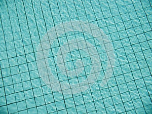 Light reflection on water surface of swimming pool