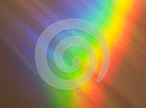 Light refraction background image. Rainbow blur reflection on stucco wall