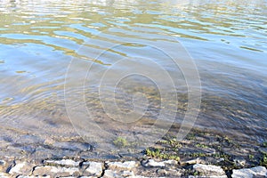 light river waves at a boat ramp