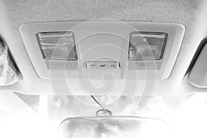 Light at roof in modern car, switch of light