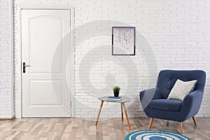 Light room interior with white door in wall