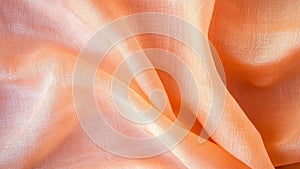 Light salmon-orange canvas with a smooth, delicate texture and minimal wrinkles