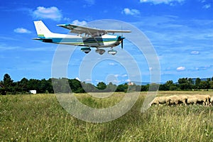 Light school plane on final