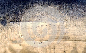 Light sepia brown paper background with vintage grunge or sponged paint texture with soft beige grungy stains