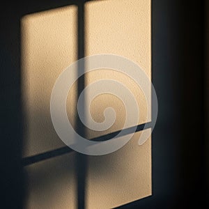 And shadow form a grid pattern on a textured beige wall resembling window