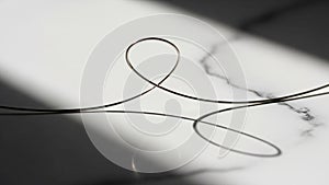 Light and shadow highlights the smooth texture of the marble and