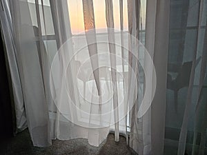 Light and shadow of morning climate on inner silk blinder or curtain photo