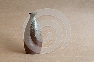 Light and shadow surfaces, vintage ceramic vases backgroun blurring.