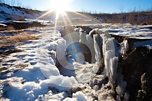 light shining on a chunk of permafrost photo