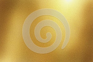 Light shining down on gold foil metal wall with copy space, abstract texture background