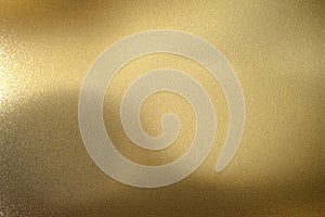 Light shining on gold wave metal panel, abstract texture background