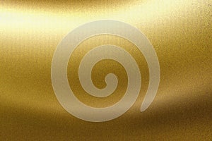 Light shining on gold wave metallic board, abstract texture background