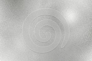 Light shining on rough silver stainless steel, abstract texture background