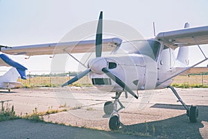 Light single-engine aircraft at the airport