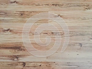 Light soft wood floor surface texture as background, wooden parquet. Old grunge washed oak laminate pattern top view.