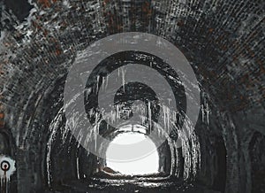 a light that is in some kind of thing in the tunnel photo