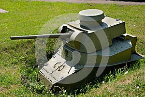Light Soviet tank in a trench at the position