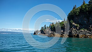 Light station on Halibut Cove arch peninsula in Kachemak Bay near Homer Spit Alaska photo