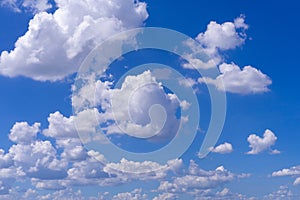 Light Stratocumulus clouds at deep blue sky.Natural sky background texture photo