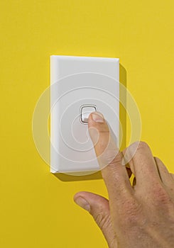 Light Switch Being Pushed