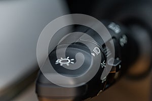 Light switch control. Close up of car light switch and control.