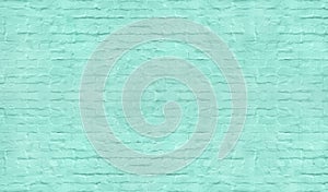 Light teal color painted old shabby brick wall texture. Pastel turquoise brickwork background