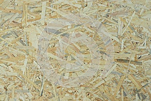 Light texture of pressed and varnished particleboard