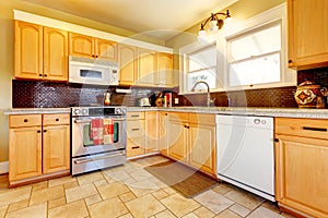 Light tones wood kitchen with brick backsplash design