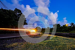 light trail at a bend in the road