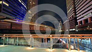 Light trail of BTS skytrain at twilight in Bangkok photo