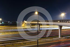 Light trails on busy night road. City