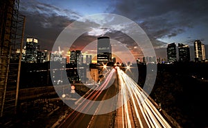 Light trails on the busy street at sunset in Jakarta, Indonesia