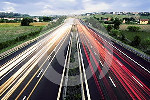 Light Trails Crossing an Hilly Landscape, Marches, Italy